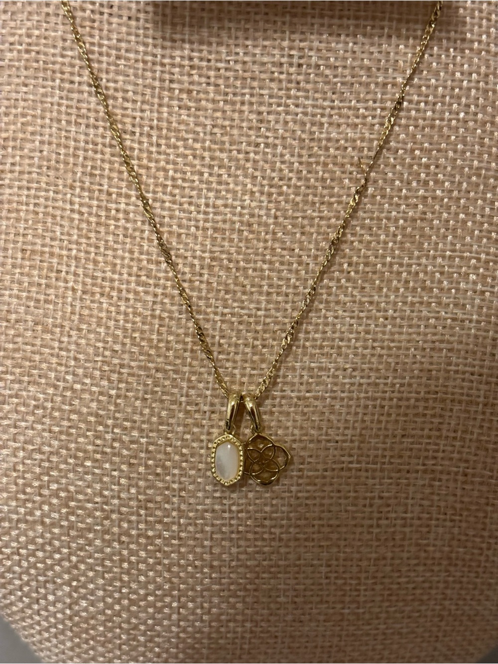 Kendra Scott Gold Necklace with White Oval Stone and Floral Charm